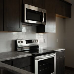 Microwave installed over a cooking range