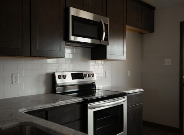 Microwave installed over a cooking range